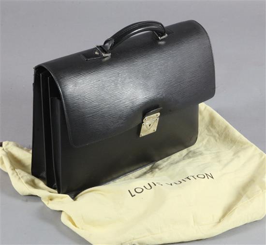 A Louis Vuitton black textured leather attaché case, 16.5in., with slip cover